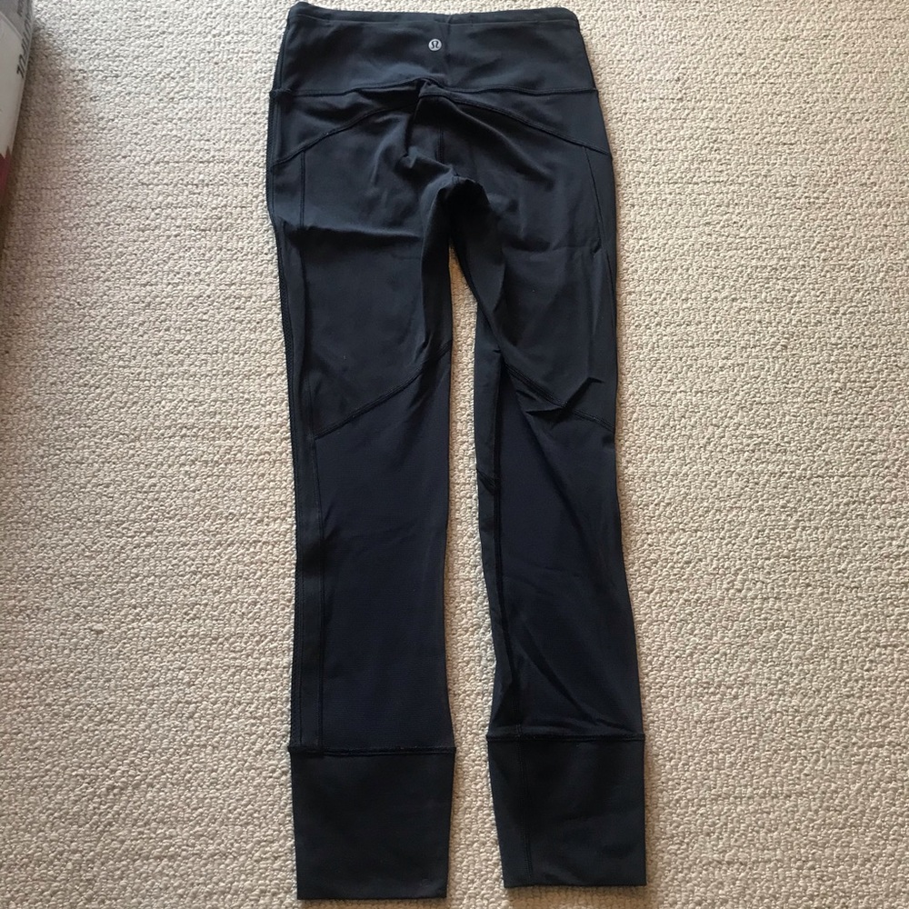 Lululemon Black Leggings with Mesh. Size 4.